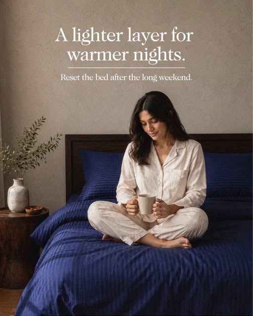 A lighter layer for warmer nights: navy striped bedding